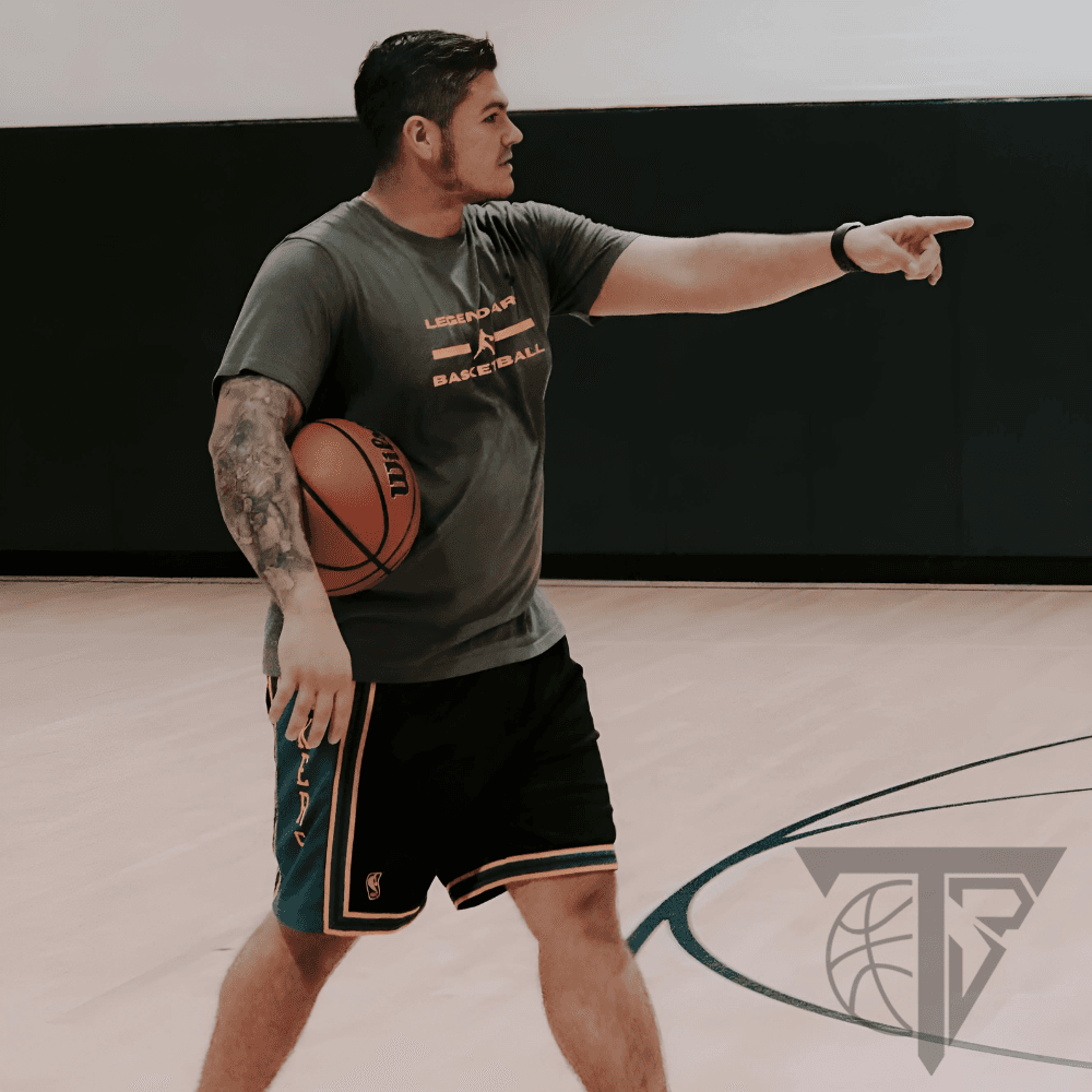 Young basketball player training
