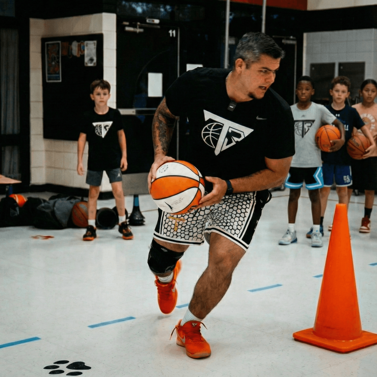 Young basketball player training
